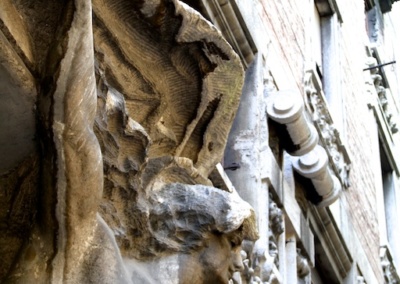Statue on the front of the building